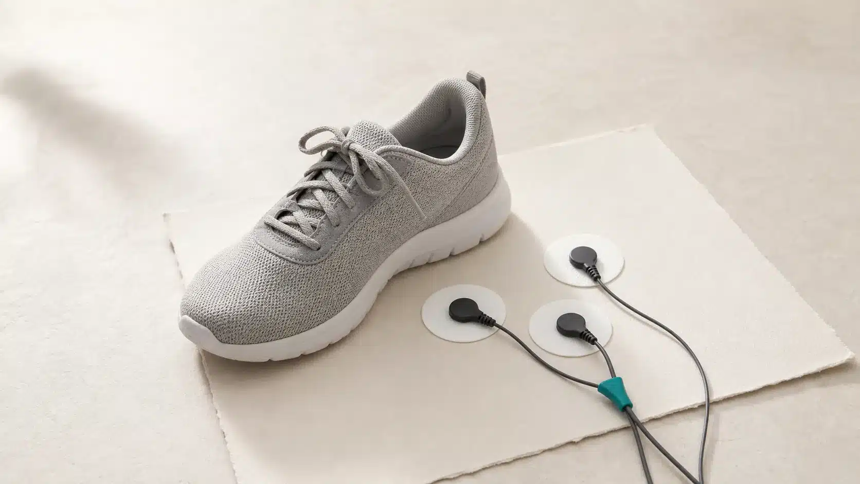 Walking shoe beside ECG electrodes used during a cardiac stress test