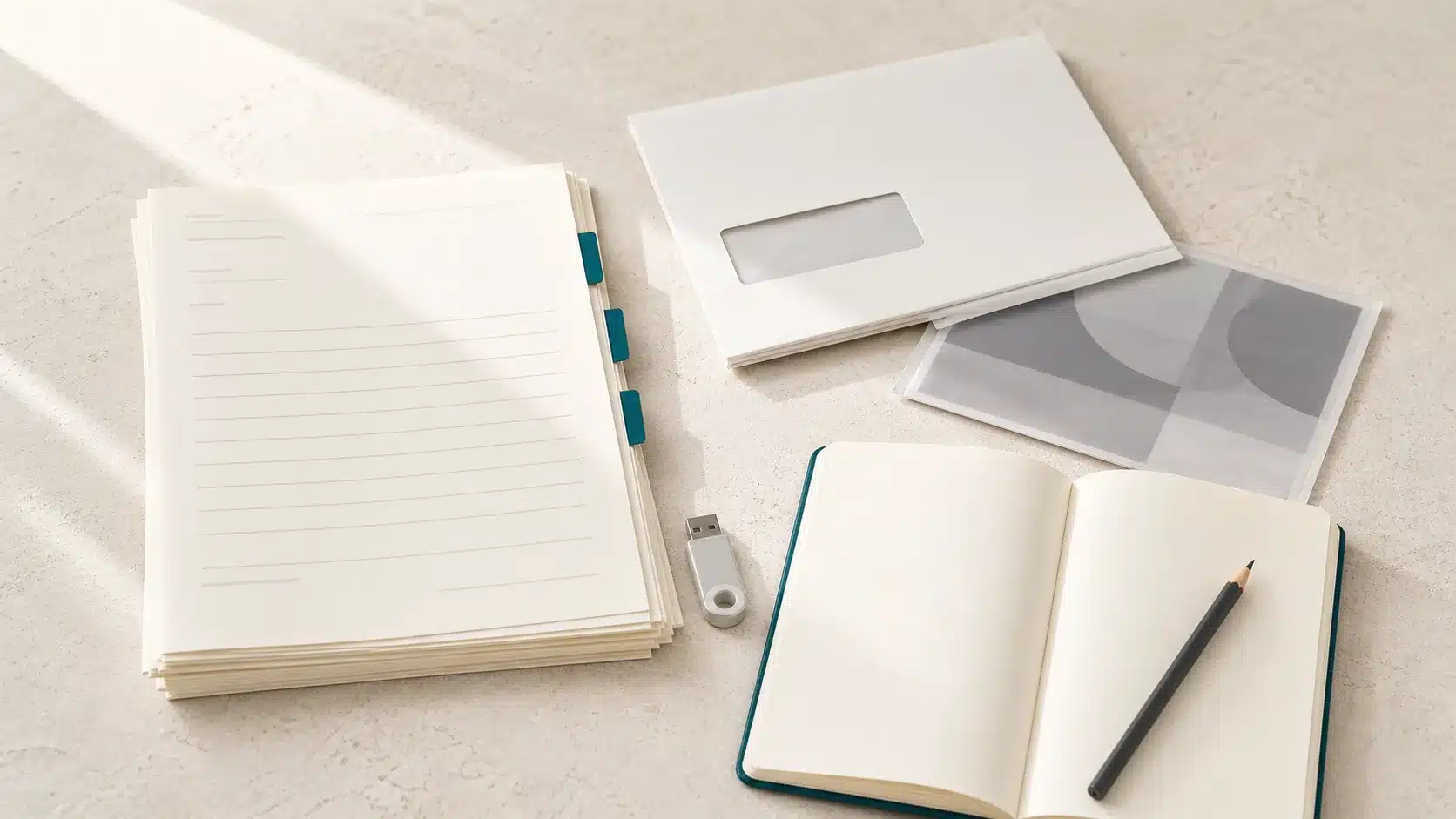 Organized medical records, imaging envelope, notebook, and transfer drive